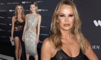 Amanda Holden, 52,  wows in a  black thigh-split gown as she joins daughter Lexi, 17, at Julien Macdonald's London Fashion Week show