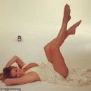 Amanda Holden wears nothing beneath plunging white dress