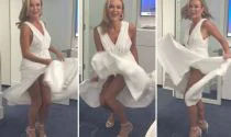 Amanda Holden shows off  her racy side as she playfully lifts up her skirt to reveal nude underwear