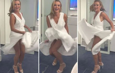 Amanda Holden shows off  her racy side as she playfully lifts up her skirt to reveal nude underwear