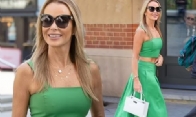 Amanda Holden shows off her toned abs in a green crop top