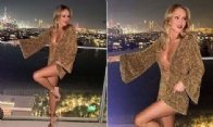 Amanda Holden Stuns in Gold Dress on Dubai Getaway