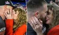 Taylor Swift and Travis Kelce kiss during Bleachers set
