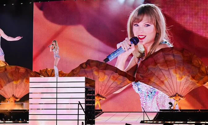 Taylor Swift shines in a diamante-studded leotard as she takes the stage during the Las Vegas stop on her The Eras Tour